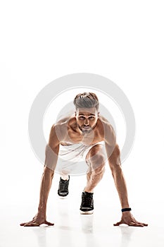 Cheerful male runner preparing to jog