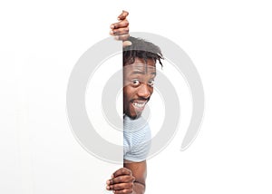 Cheerful man with blank signboard