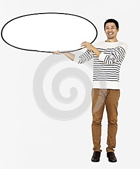 Cheerful man holding a blank white board