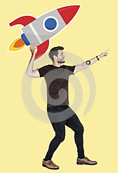 Cheerful man with launching rocket symbol