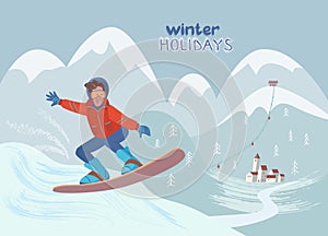 Cheerful man is riding and jumping on a snowboard on a mountain pick.