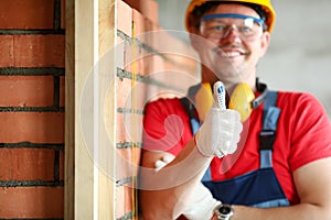 Cheerful man and well done sign