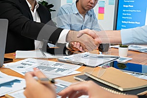 Cheerful meeting room, businesspeople celebrate in meeting room. Habiliment