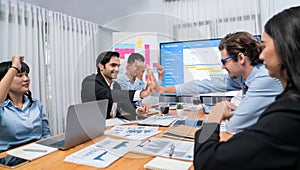 Cheerful meeting room, businesspeople celebrate in meeting room. Habiliment