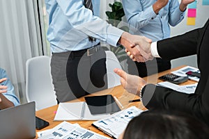 Cheerful meeting room, businesspeople celebrate in meeting room. Habiliment