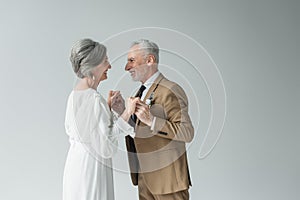 cheerful middle aged man in suit