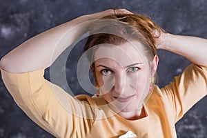 Cheerful middle aged woman studio portrait