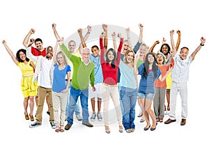 Cheerful Multi-Ethnic Group Of People With Their Arms Raised