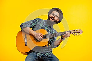 Cheerful musician with guitar