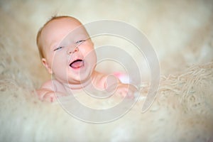 Cheerful newborn baby