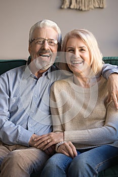 Cheerful old senior retired family married couple posing for portrait