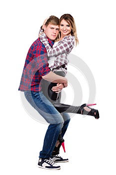 Cheerful pair posing in casual clothes