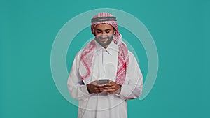 Cheerful person messaging on phone