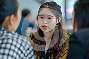 Cheerful Portrait of female student talking with university friends