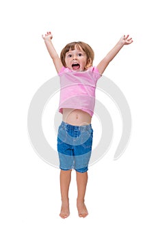 Cheerful positive little girl 3 years old happily jumping up and screaming cheers isolated on white background. Happy childhood