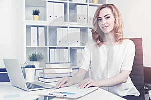 Cheerful red haired businesswoman, toned