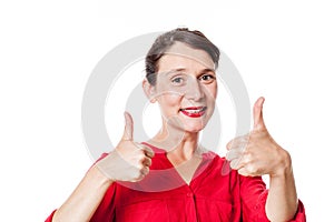 Cheerful 30s woman with two thumbs up approving photo