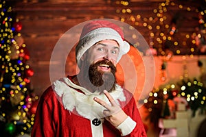 Cheerful Santa claus. Winter holidays. Cozy home atmosphere. Winter decorations. Santa Claus bearded hipster smiling