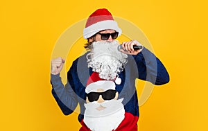 cheerful santa man hipster sing christmas music songs. preparation and celebration. funny party time. happy winter