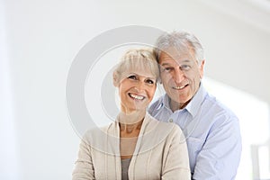 Cheerful senior couple at home