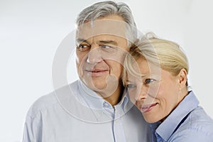 Cheerful senior couple isolated