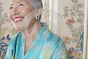 Cheerful Senior Woman Looking Up