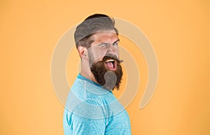 Cheerful smile. Man bearded hipster with mustache. Beard mustache grooming guide. Hipster handsome bearded guy yellow