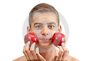 Cheerful smiling boy with red apple, isolated on white