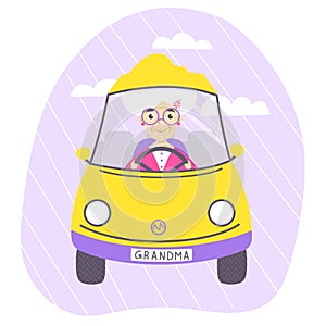 Cheerful smiling grandma driving yellow car