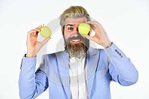 Cheerful smiling man with apples. Harvesting business. Apple became symbol for knowledge. Vitamin and diet. Fruit