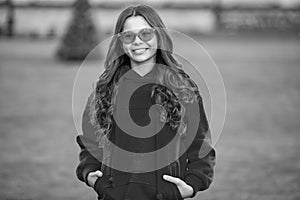 cheerful stylish teen girl wear glasses. photo of stylish teen girl wear hoodie.