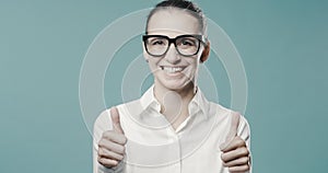 Cheerful successful businesswoman smiling at camera