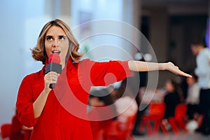 Cheerful Talented Woman Singing in the Microphone