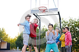 Cheerful team celebrate their winning in basketball game