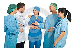 Cheerful team of doctors having conversation