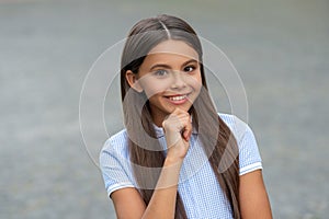 cheerful teen girl portrait in the street. photo of teen girl portrait. teen girl portrait.