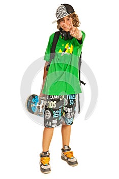 Cheerful teen with skateboard