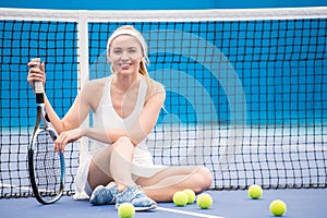 Cheerful Tennis Player in Court