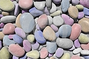 Cheerful texture with colorful colored sea stones