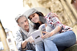 Cheerful tourists in city tour