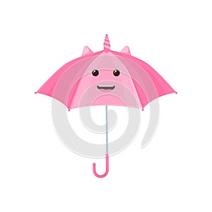 A cheerful umbrella. A beautiful pink children s umbrella with unicorn horns and a cheerful smile. Pink umbrella in