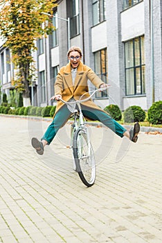 Cheerful woman on bike