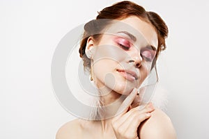 cheerful woman bright makeup naked shoulders and clear skin close-up emotions