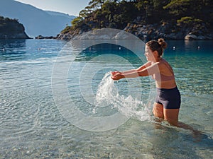 Cheerful woman enjoying the beach