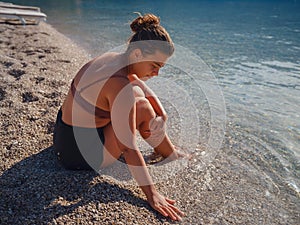 Cheerful woman enjoying the beach