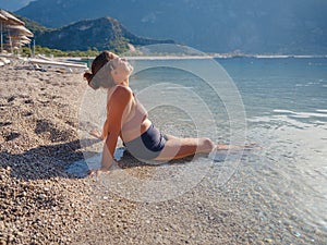 Cheerful woman enjoying the beach