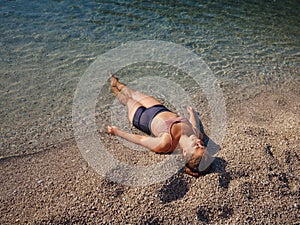 Cheerful woman enjoying the beach