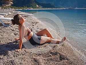 Cheerful woman enjoying the beach