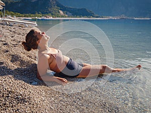 Cheerful woman enjoying the beach