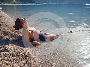 Cheerful woman enjoying the beach